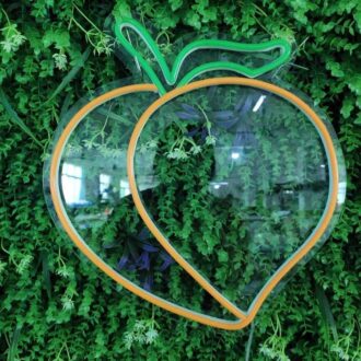 Alternative view of Peach emoji neon sign